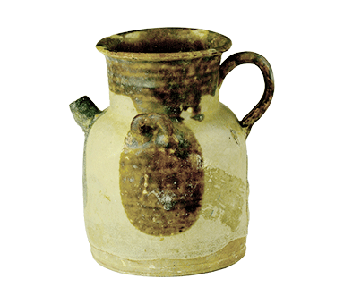 White-glazed handled ewer with underglaze bi-color of brown and green big speckles